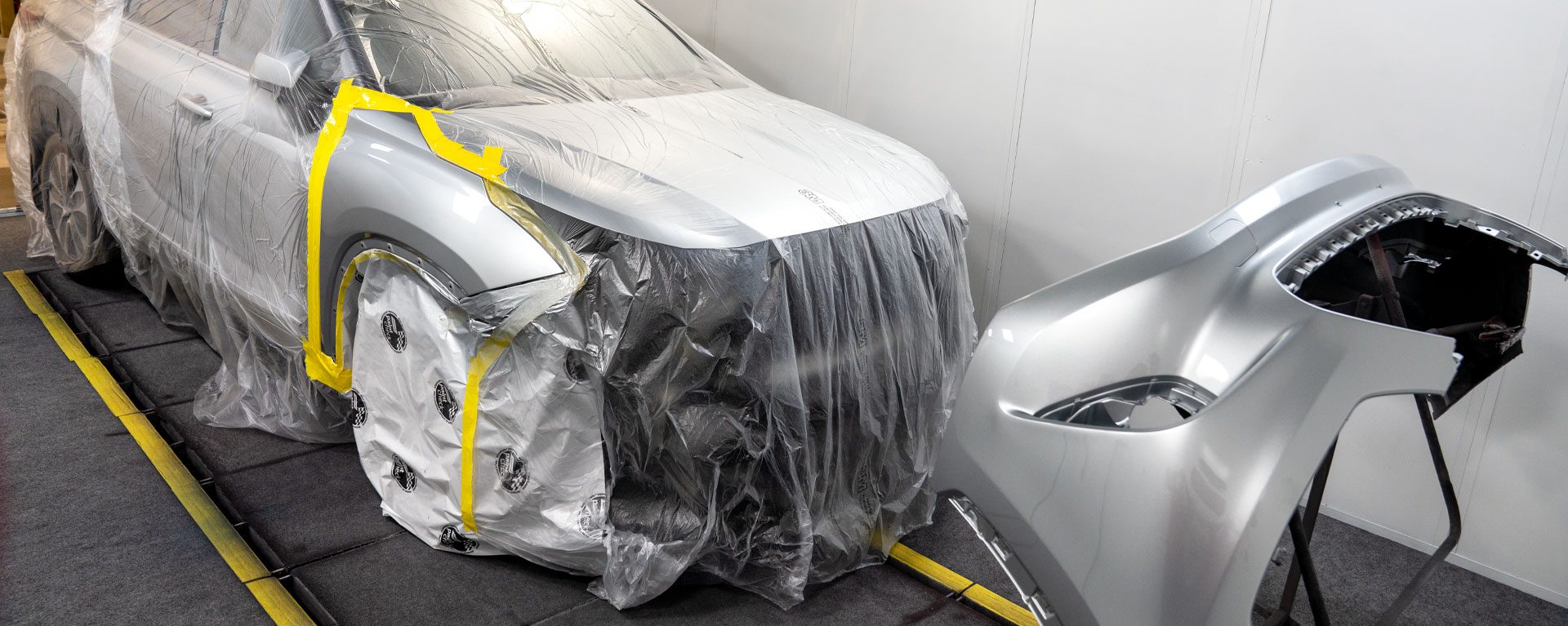 Car in the paint booth at Northland Collision